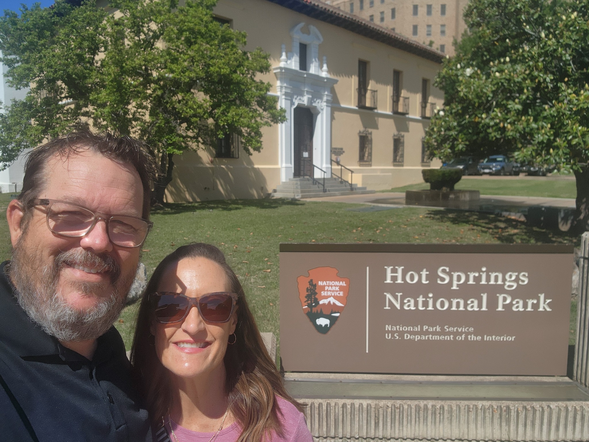 Scott and Kristen beside the Hot Springs National Park sign