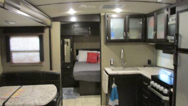 Kitchen and living area inside our 2018 Grand Design Imagine 2600RB
